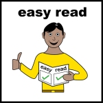 Man in yellow shirt holding an Easy Read sign